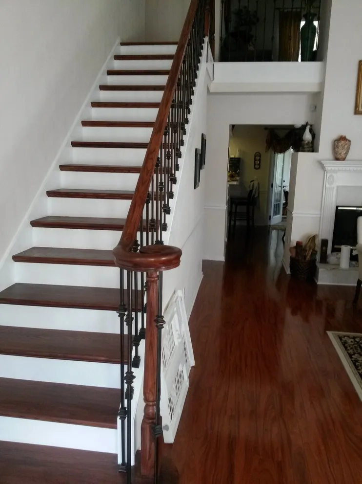 Wrought Iron Stair Renovations by Elite Construction Of Jax, Inc. - Photo 13
