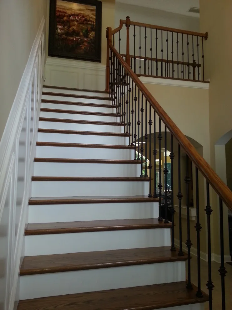 Wrought Iron Stair Renovations by Elite Construction Of Jax, Inc. - Photo 4