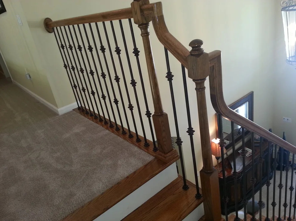 Wrought Iron Stair Renovations by Elite Construction Of Jax, Inc. - Photo 2