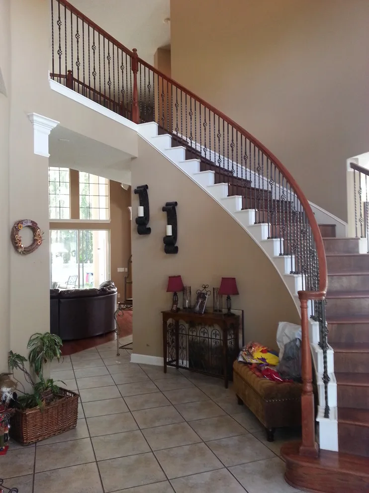 Wrought Iron Stair Renovations by Elite Construction Of Jax, Inc. - Photo 41