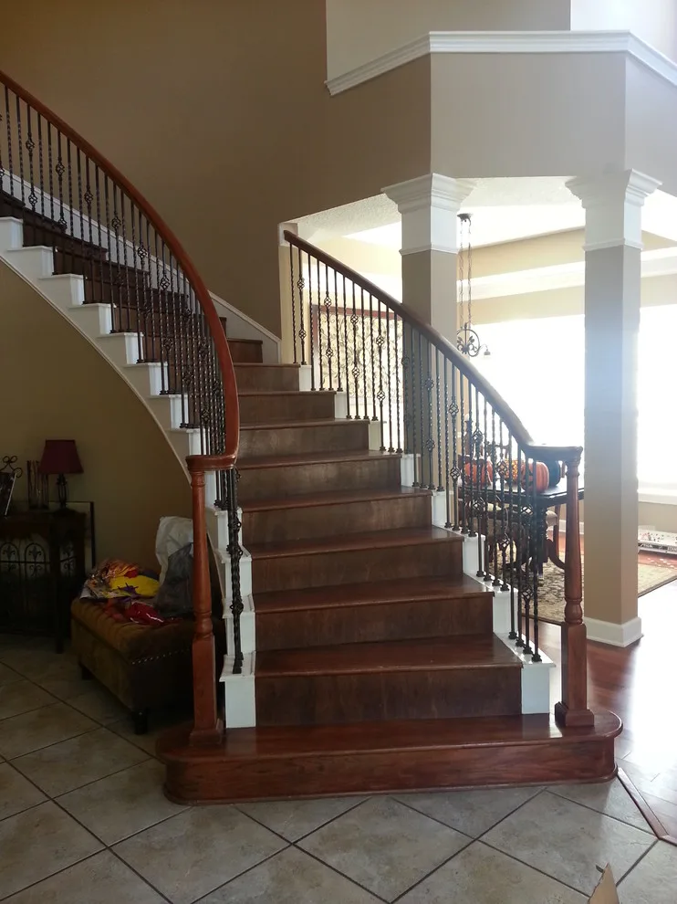 Wrought Iron Stair Renovations by Elite Construction Of Jax, Inc. - Photo 14