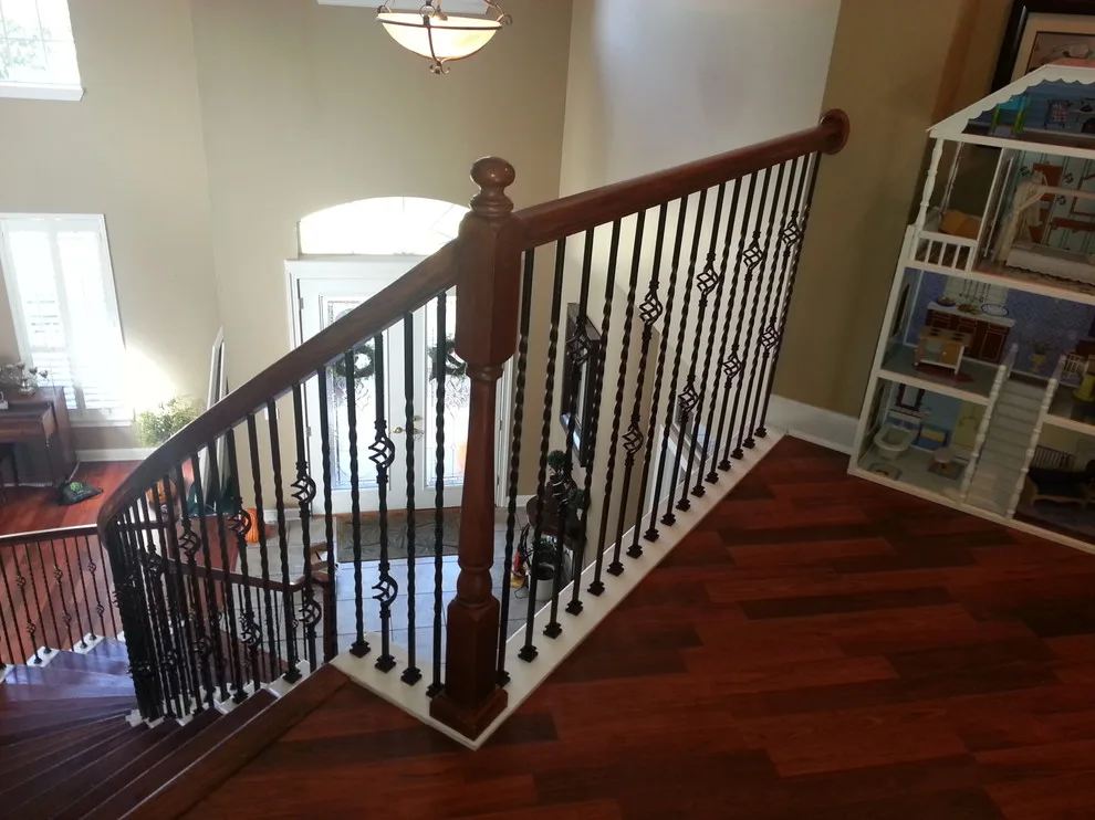 Wrought Iron Stair Renovations by Elite Construction Of Jax, Inc. - Photo 15