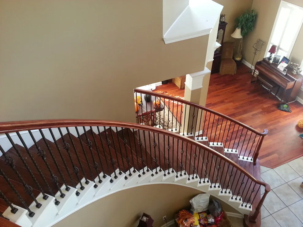 Wrought Iron Stair Renovations by Elite Construction Of Jax, Inc. - Photo 19
