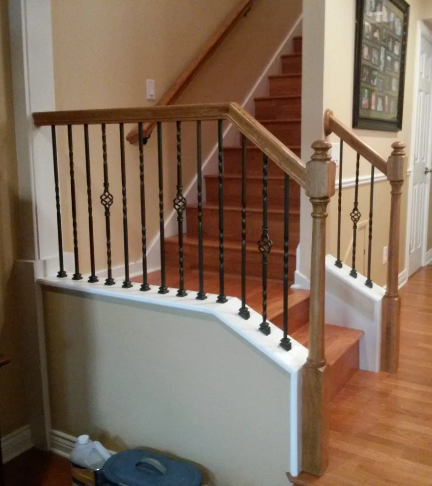 Wrought Iron Stair Renovations by Elite Construction Of Jax, Inc. - Photo 16