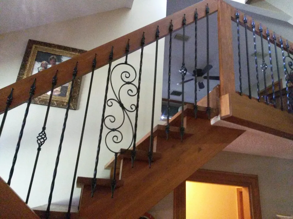 Wrought Iron Stair Renovations by Elite Construction Of Jax, Inc. - Photo 39