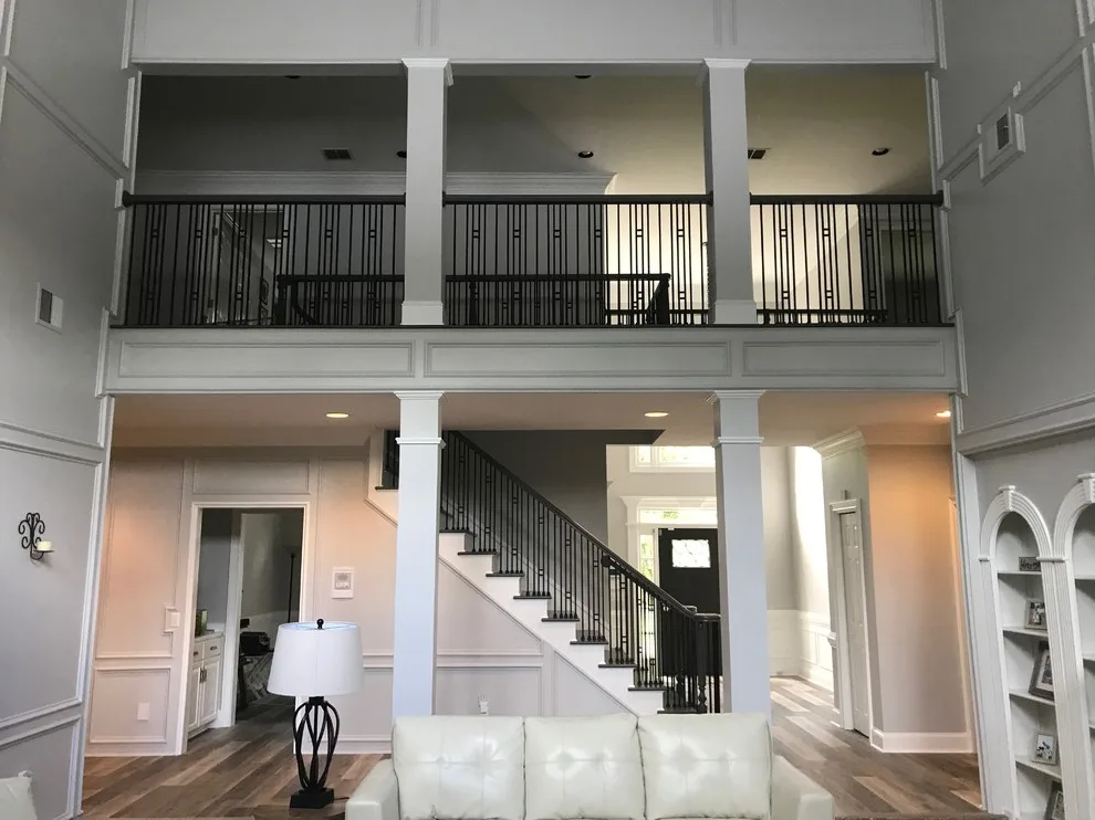 Wrought Iron Stair Renovations by Elite Construction Of Jax, Inc. - Photo 10