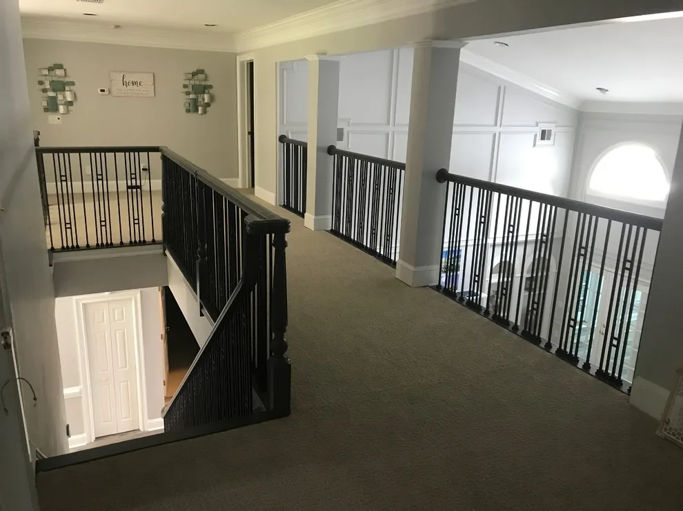 Wrought Iron Stair Renovations by Elite Construction Of Jax, Inc. - Photo 23