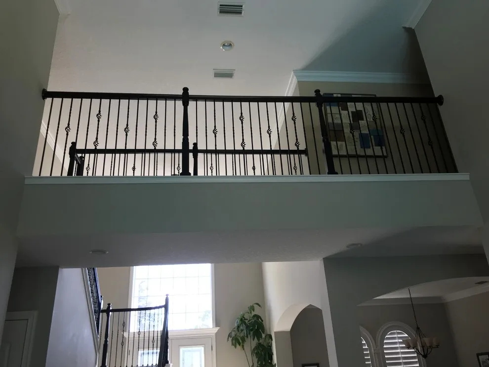 Wrought Iron Stair Renovations by Elite Construction Of Jax, Inc. - Photo 22
