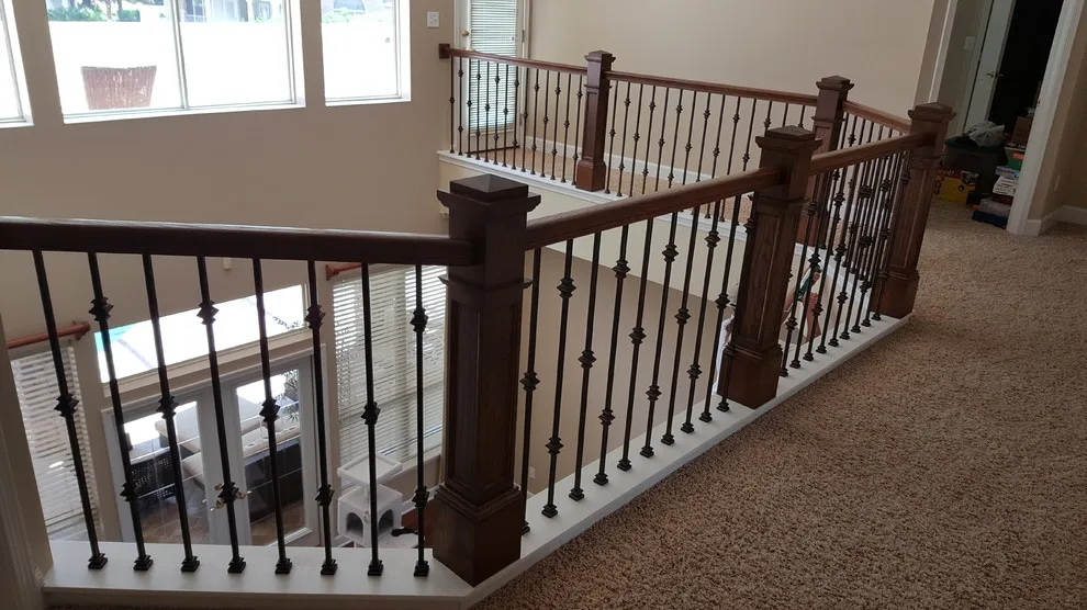 Wrought Iron Stair Renovations by Elite Construction Of Jax, Inc. - Photo 26