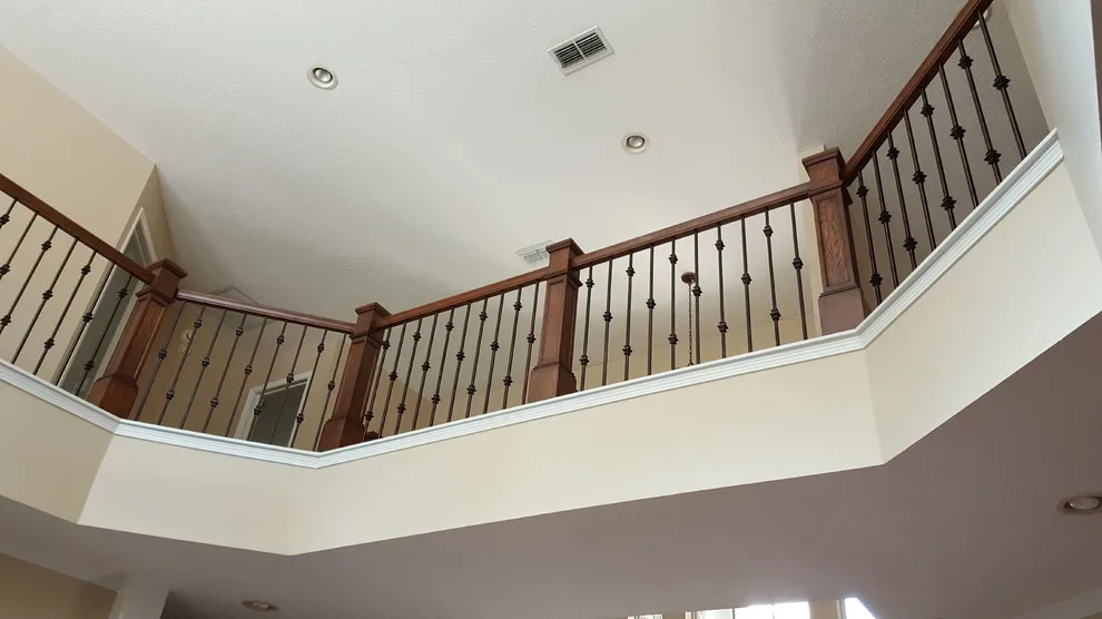 Wrought Iron Stair Renovations by Elite Construction Of Jax, Inc. - Photo 6