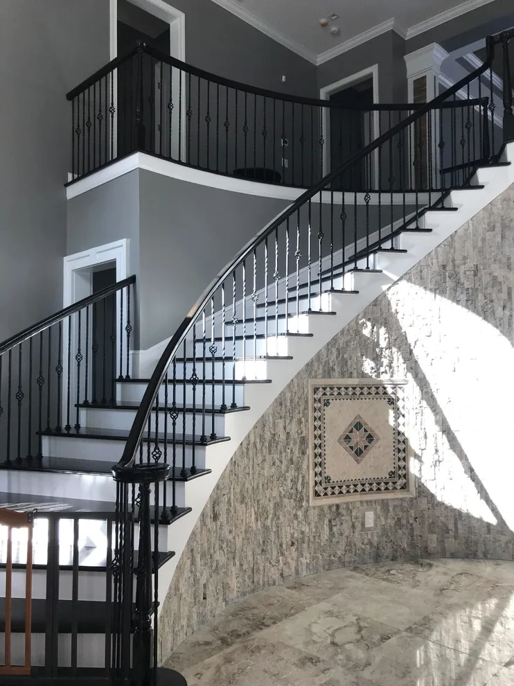 Wrought Iron Stair Renovations by Elite Construction Of Jax, Inc. - Photo 20