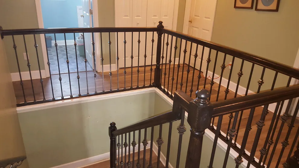 Wrought Iron Stair Renovations by Elite Construction Of Jax, Inc. - Photo 3