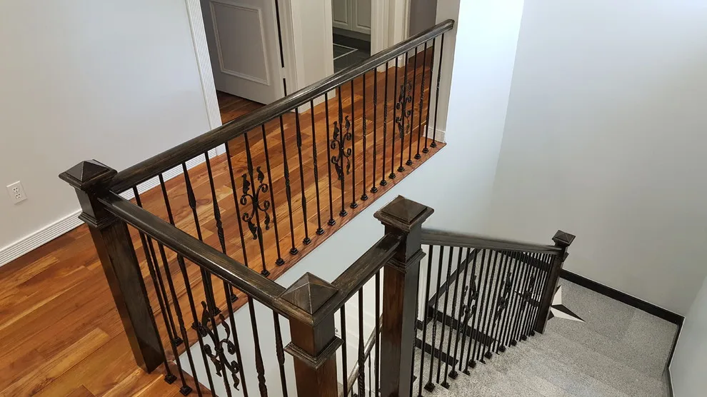 Wrought Iron Stair Renovations by Elite Construction Of Jax, Inc. - Photo 31
