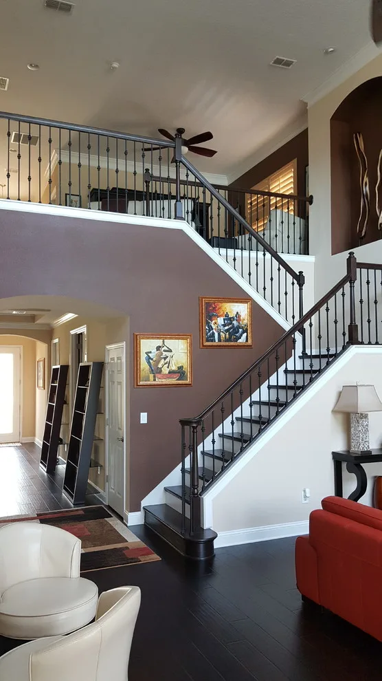 Wrought Iron Stair Renovations by Elite Construction Of Jax, Inc. - Photo 24