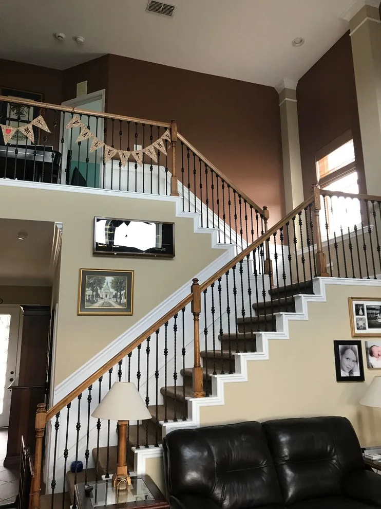Wrought Iron Stair Renovations by Elite Construction Of Jax, Inc. - Photo 8