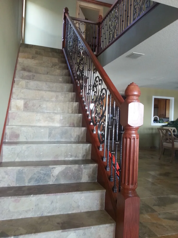 Wrought Iron Stair Renovations by Elite Construction Of Jax, Inc. - Photo 33