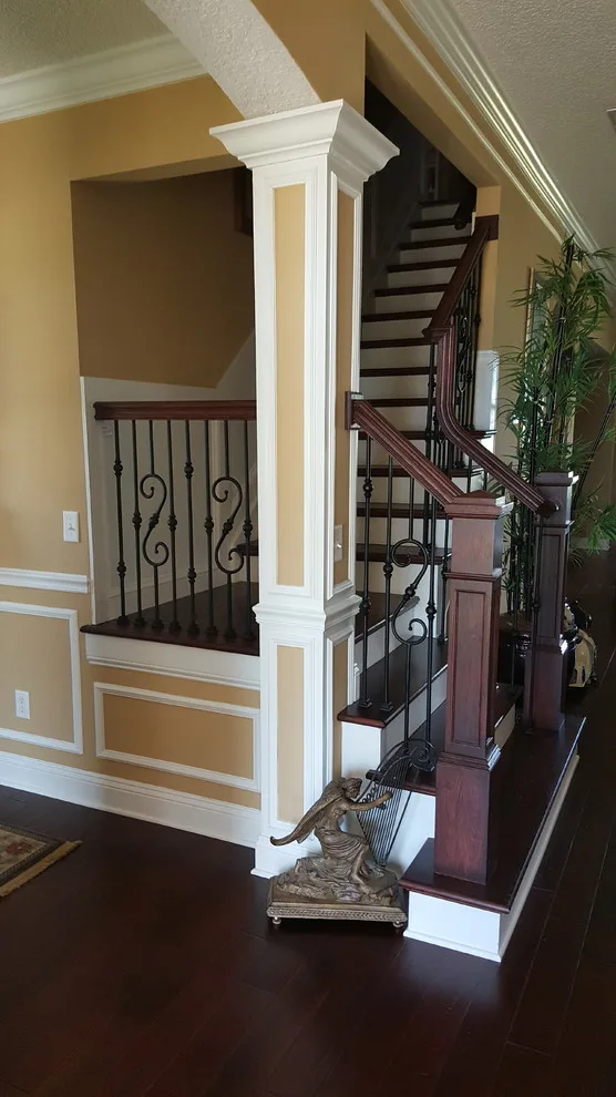 Wrought Iron Stair Renovations by Elite Construction Of Jax, Inc. - Photo 17