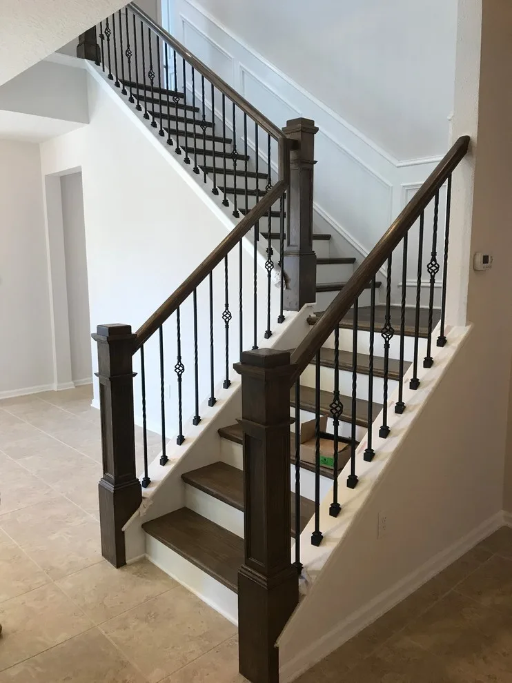 Wrought Iron Stair Renovations by Elite Construction Of Jax, Inc. - Photo 36