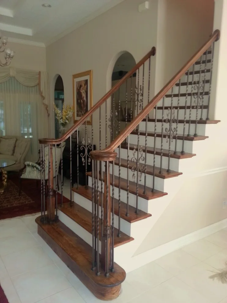 Wrought Iron Stair Renovations by Elite Construction Of Jax, Inc. - Photo 35