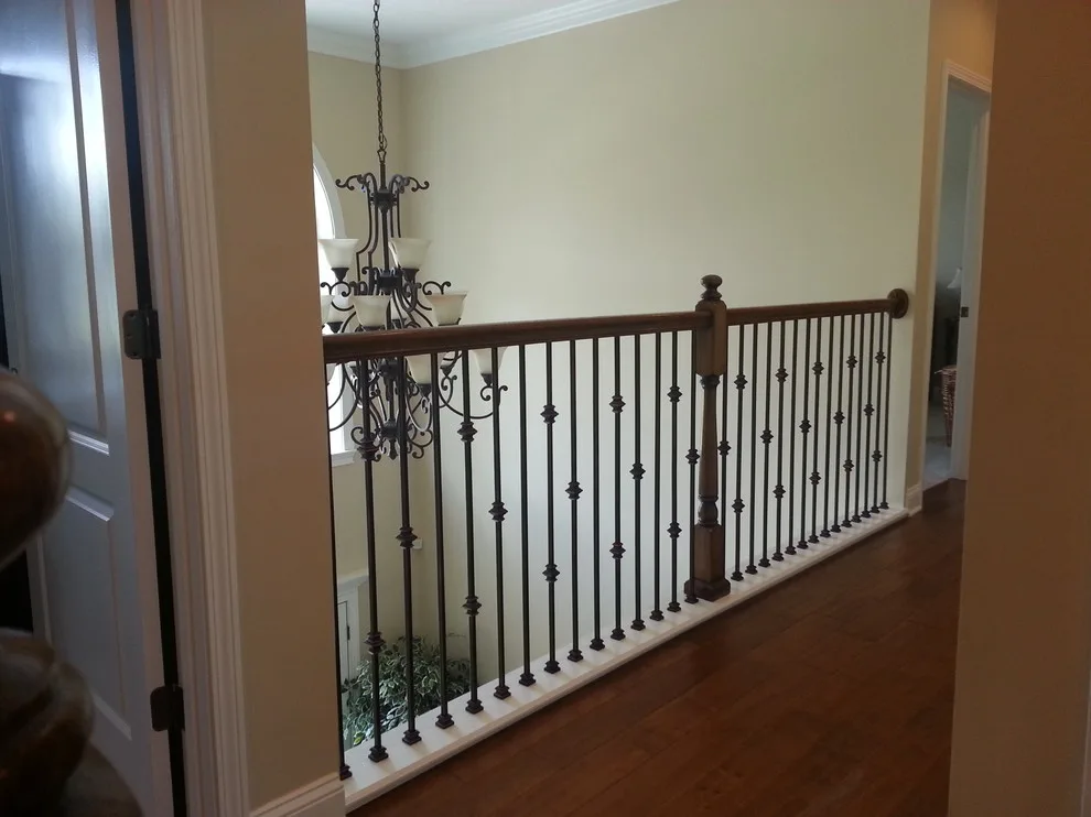Wrought Iron Stair Renovations by Elite Construction Of Jax, Inc. - Photo 28
