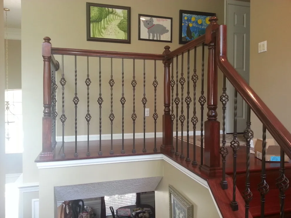 Wrought Iron Stair Renovations by Elite Construction Of Jax, Inc. - Photo 32