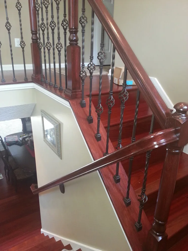 Wrought Iron Stair Renovations by Elite Construction Of Jax, Inc. - Photo 42