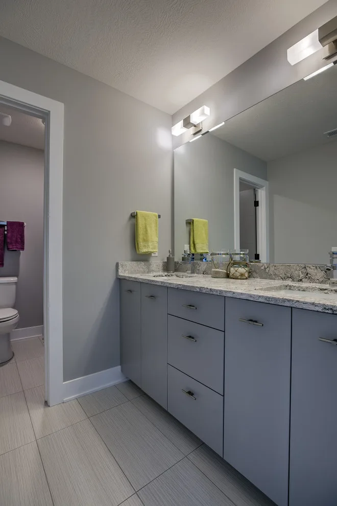Contemporary and Roomy 1.5 Story Emphasizing Functionality and Organization by Sierra Homes (Omaha, NE) - Photo 24