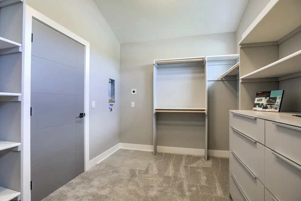 Contemporary and Roomy 1.5 Story Emphasizing Functionality and Organization by Sierra Homes (Omaha, NE) - Photo 19