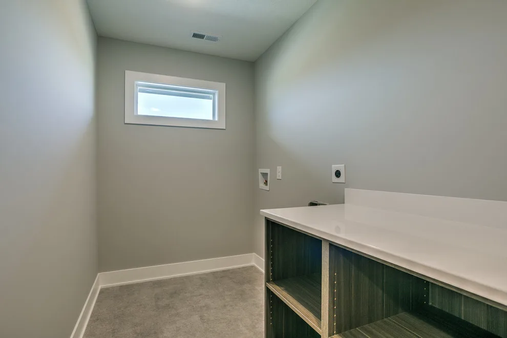 Contemporary and Roomy 1.5 Story Emphasizing Functionality and Organization by Sierra Homes (Omaha, NE) - Photo 7