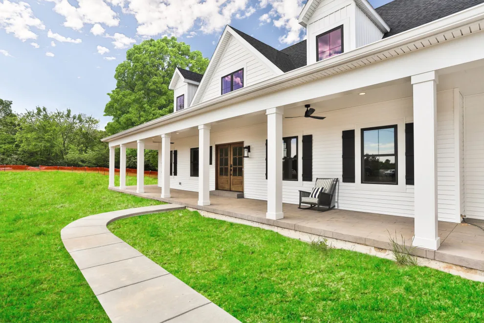 Contemporary Farmhouse Enhanced with Reclaimed Materials by Hibbs Luxury Homes - St Louis, MO - Photo 12