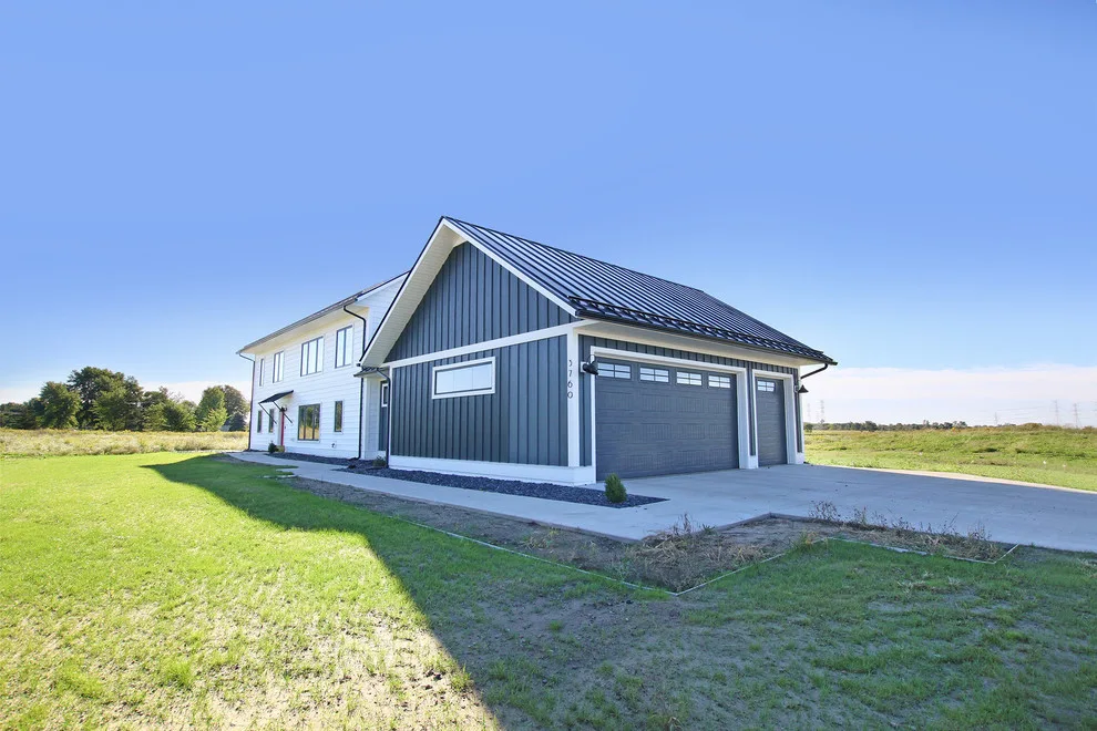 Contemporary Farmhouse Embracing Sunlight by R-Value Homes - Photo 5