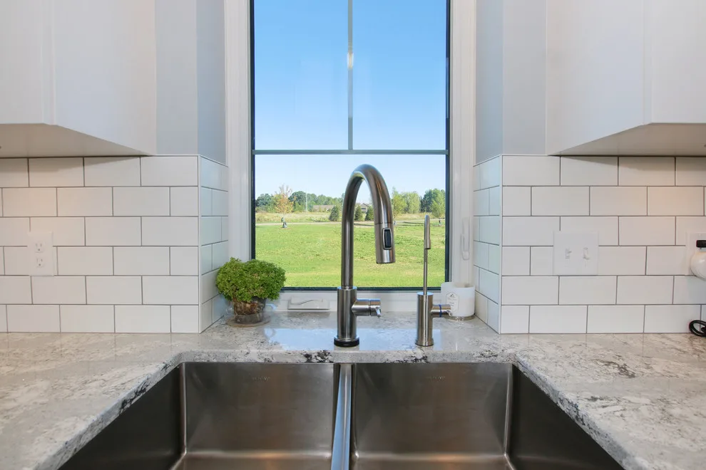 Contemporary Farmhouse Embracing Sunlight by R-Value Homes - Photo 25