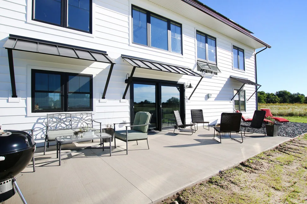 Contemporary Farmhouse Embracing Sunlight by R-Value Homes - Photo 7