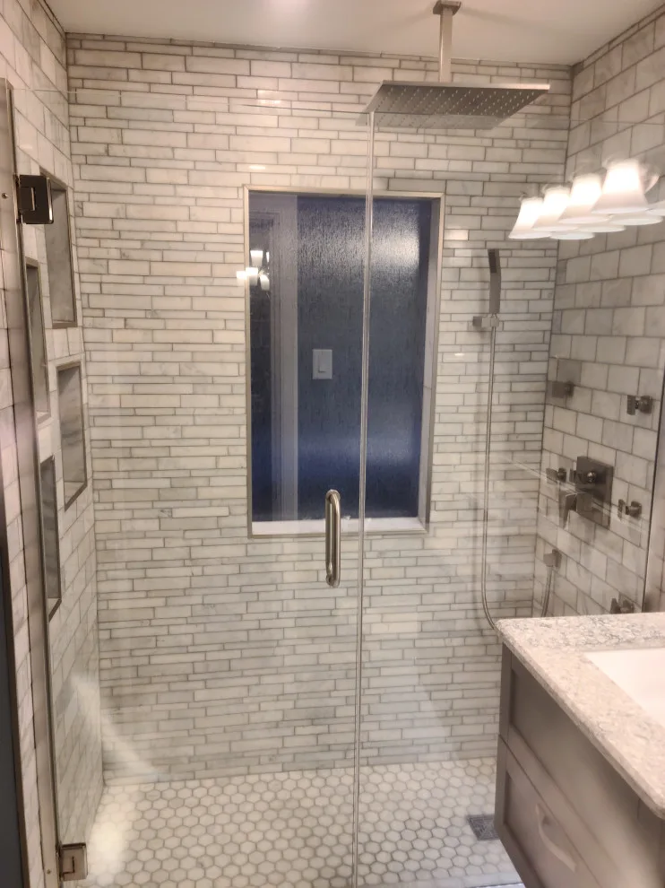 Revamping a Classic Bathroom by Empire Homes And Remodeling Inc. - Photo 4