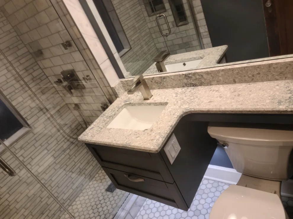 Revamping a Classic Bathroom by Empire Homes And Remodeling Inc. - Photo 10