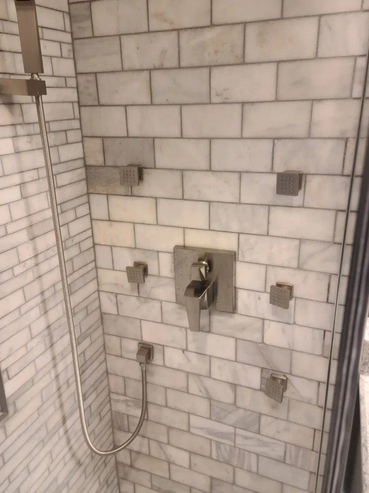 Revamping a Classic Bathroom by Empire Homes And Remodeling Inc. - Photo 6