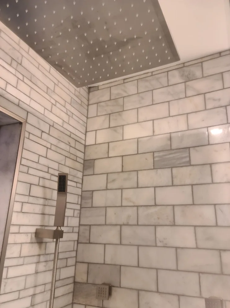 Revamping a Classic Bathroom by Empire Homes And Remodeling Inc. - Photo 7