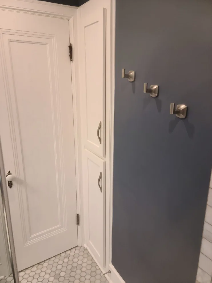 Revamping a Classic Bathroom by Empire Homes And Remodeling Inc. - Photo 8