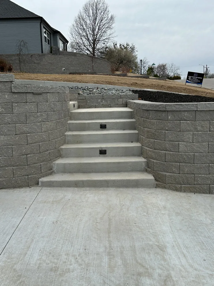 Updated stairs, retaining wall, and driveway by Dana Build And Design - Photo 4