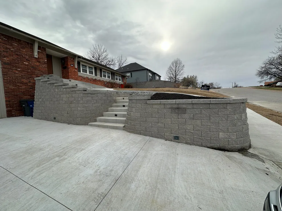 Updated stairs, retaining wall, and driveway by Dana Build And Design - Photo 3