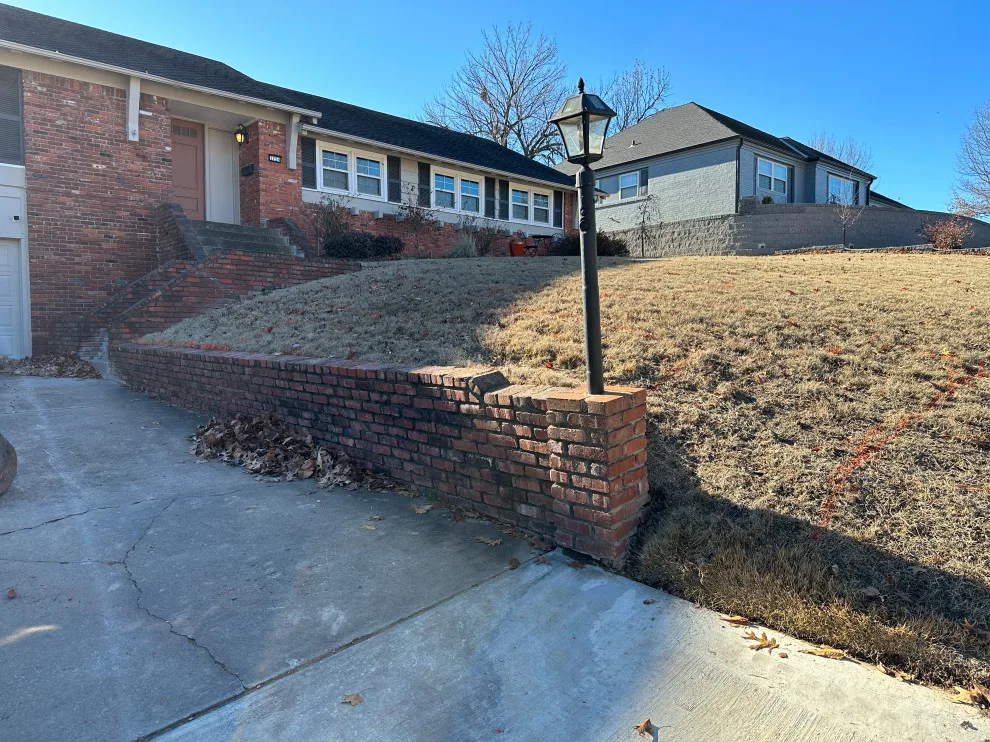 Updated stairs, retaining wall, and driveway by Dana Build And Design - Photo 6