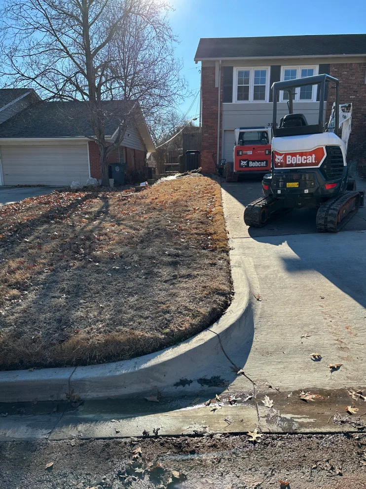 Updated stairs, retaining wall, and driveway by Dana Build And Design - Photo 8