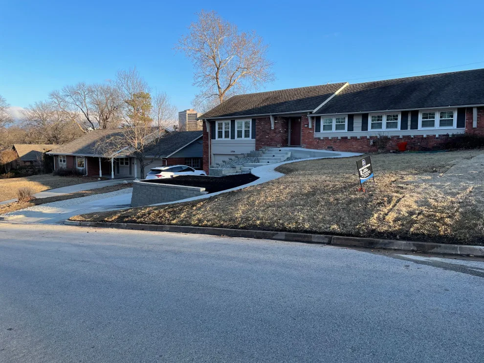 Updated stairs, retaining wall, and driveway by Dana Build And Design - Photo 11
