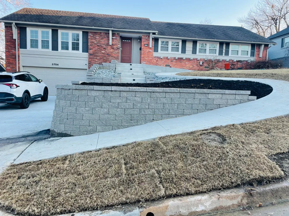 Updated stairs, retaining wall, and driveway by Dana Build And Design - Photo 9