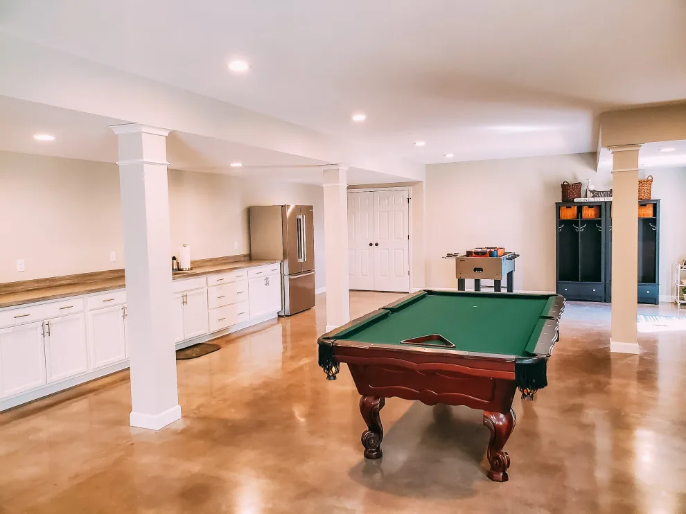 Refined Concrete Basement Renovation by Stockell Custom Homes & Construction - Photo 9