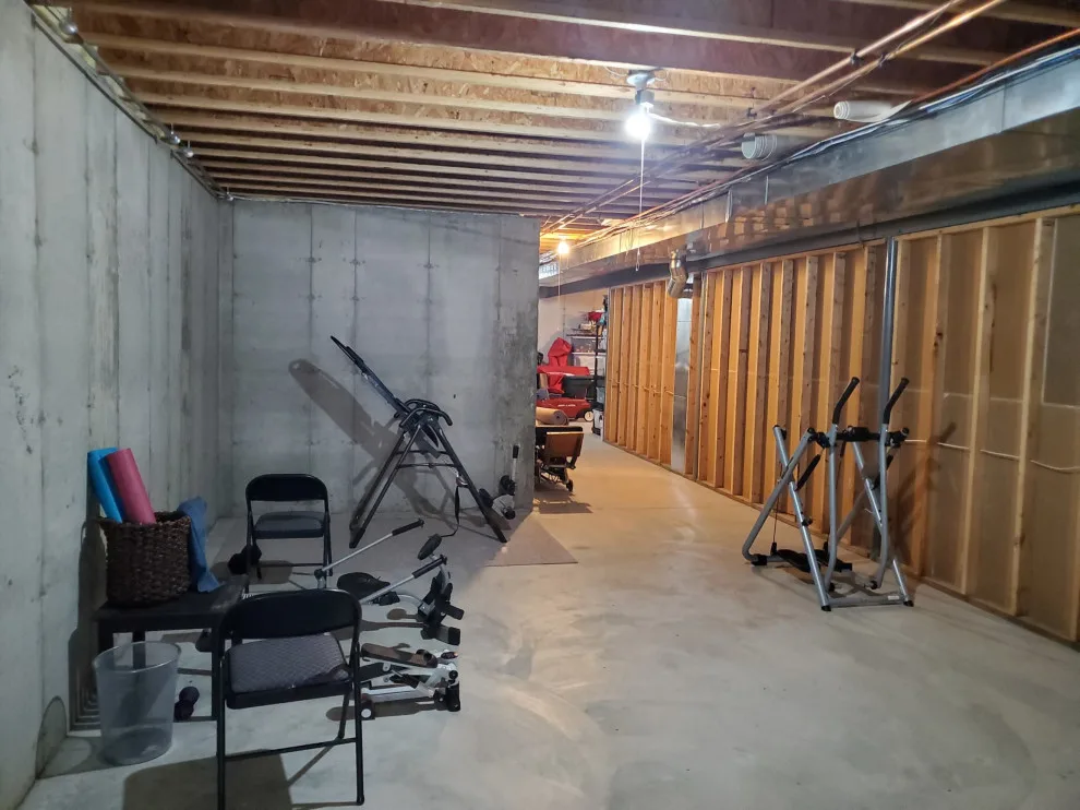 Refined Concrete Basement Renovation by Stockell Custom Homes & Construction - Photo 7