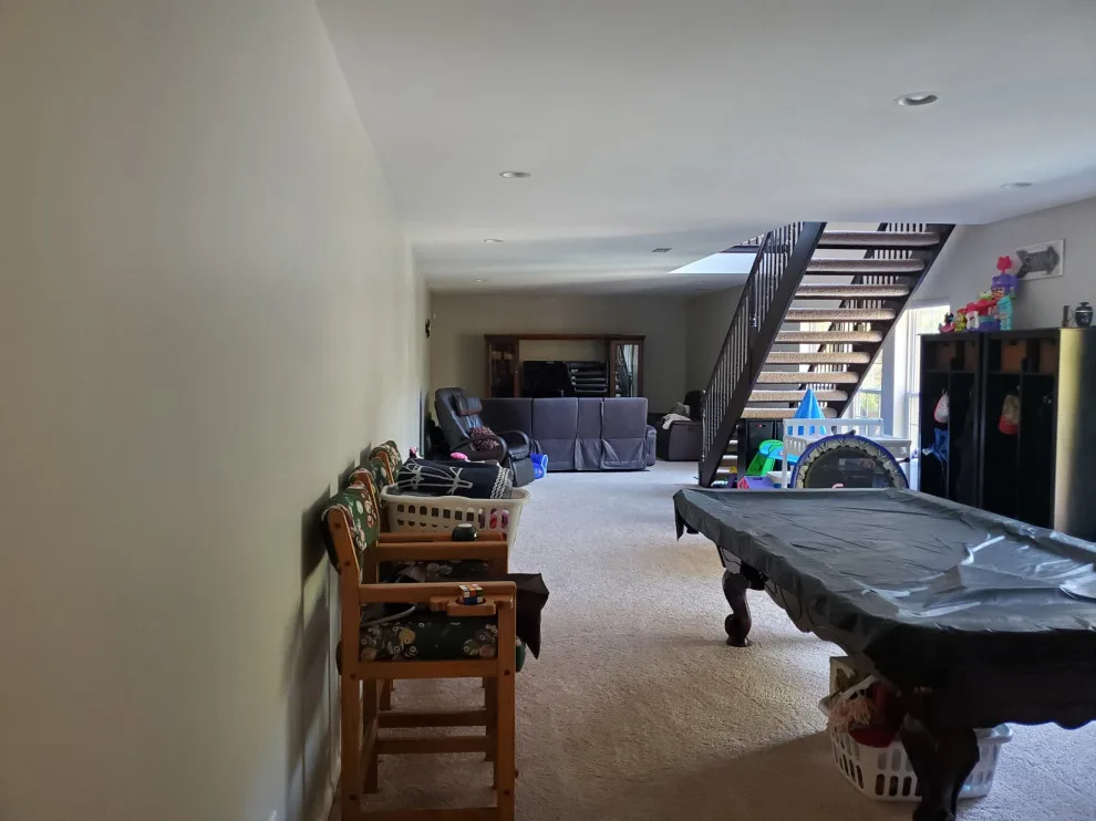 Refined Concrete Basement Renovation by Stockell Custom Homes & Construction - Photo 8