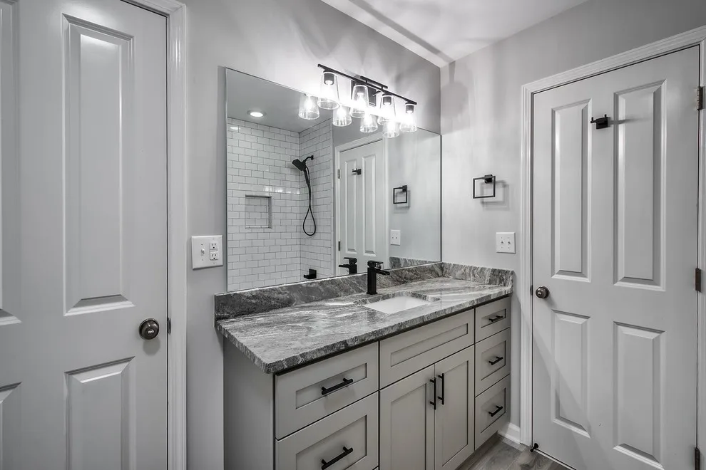 Modern Dual Bathroom Renovation by River Tree Homes LLC - Photo 5