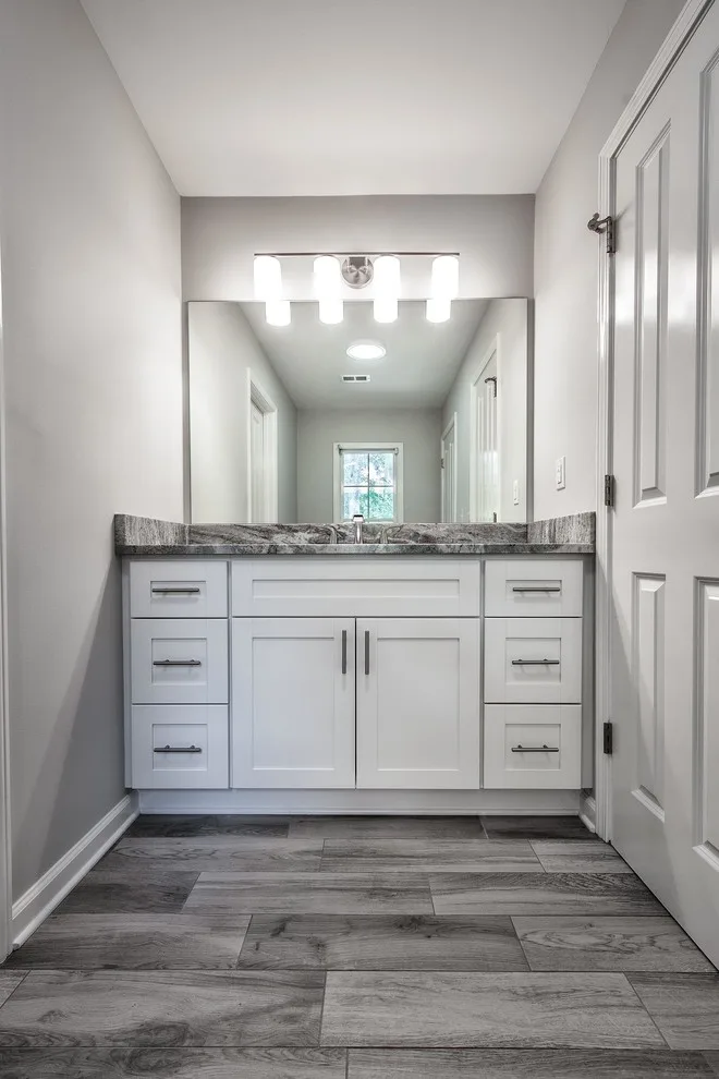 Modern Dual Bathroom Renovation by River Tree Homes LLC - Photo 4