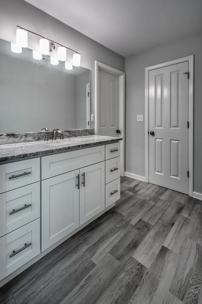 Modern Dual Bathroom Renovation by River Tree Homes LLC - Photo 7